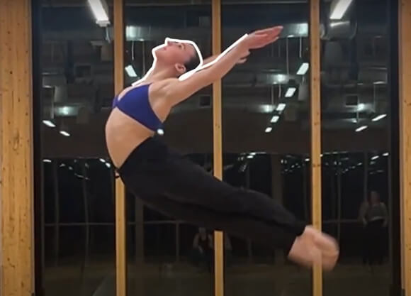A dancer in the middle of a jump