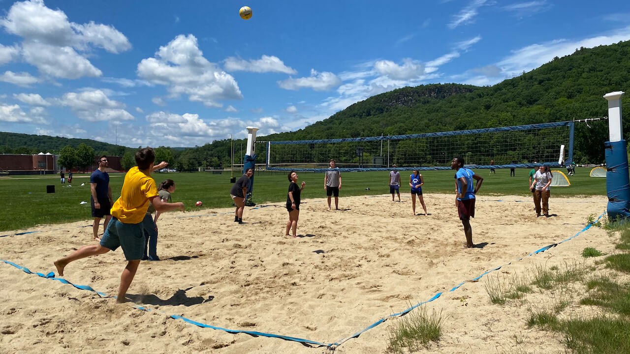 QUIP-RS students play volleyball on the Mount Carmel Campus.